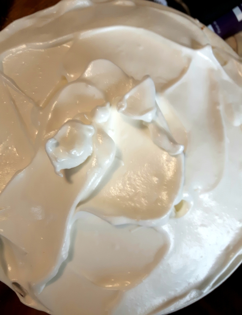Spread meringue over custard pie