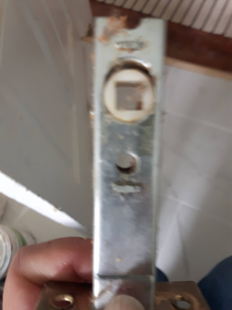 Old missing doorknob - latch